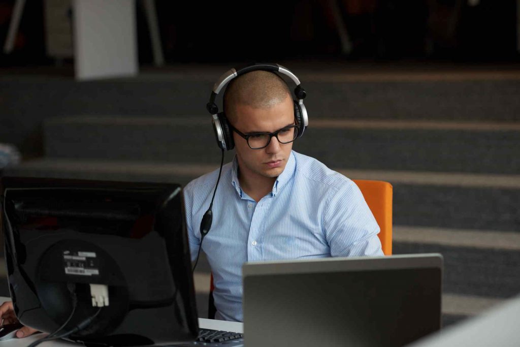 startup business, software developer working on computer at modern office